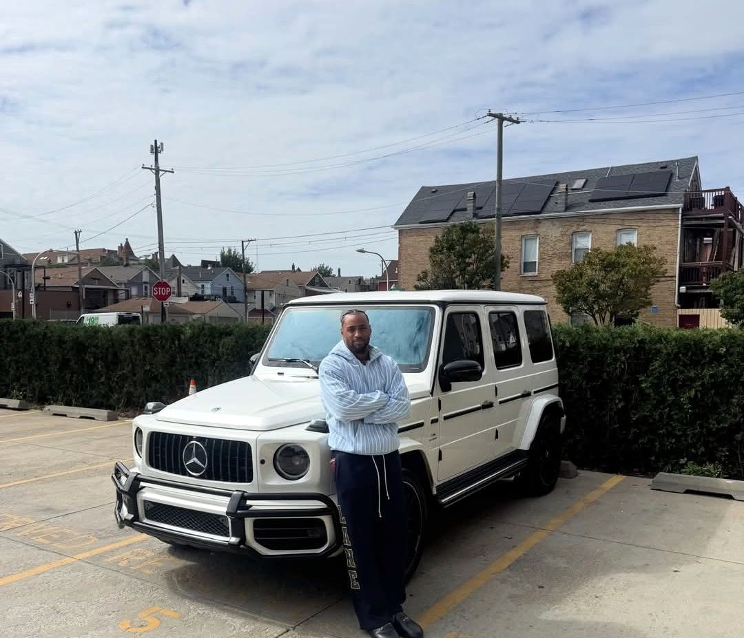 Kyler Gordon with a white Mercedes G-Wagon